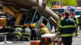 Injured worker extricated after equipment collapse on Atlantic Street in Bridgeport