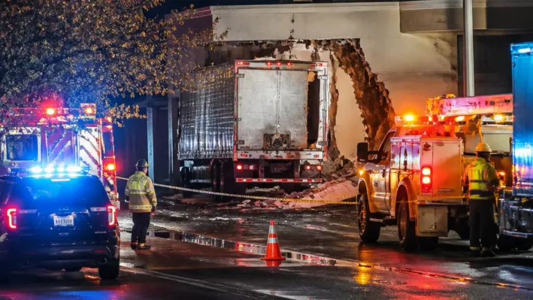 Three injured after tractor-trailer crashes into New Haven building on Kimberly Avenue